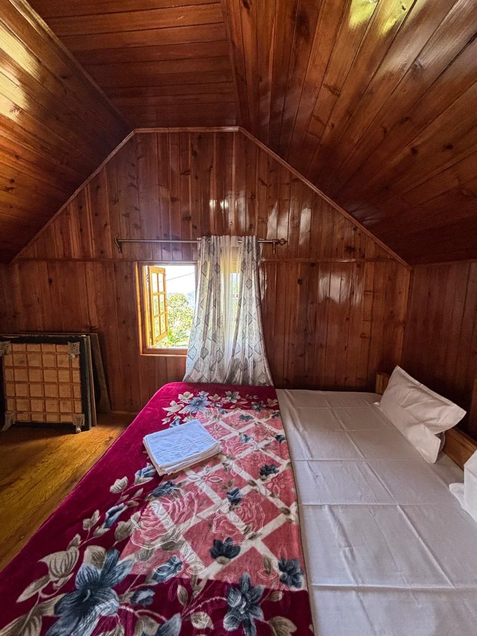 Wooden Attic Room at Tashi Ville Farmstay in Lamahatta
